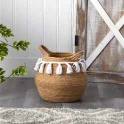 11" Boho Chic Handmade Natural Cotton Woven Basket Planter With Tassels 7 11" Boho Chic Handmade Natural Cotton Woven Basket Planter With Tassels -Michaels Shop D293127S 4